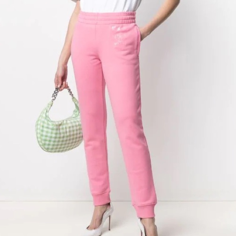 Moschino logo-print cotton sweat pants. Pink